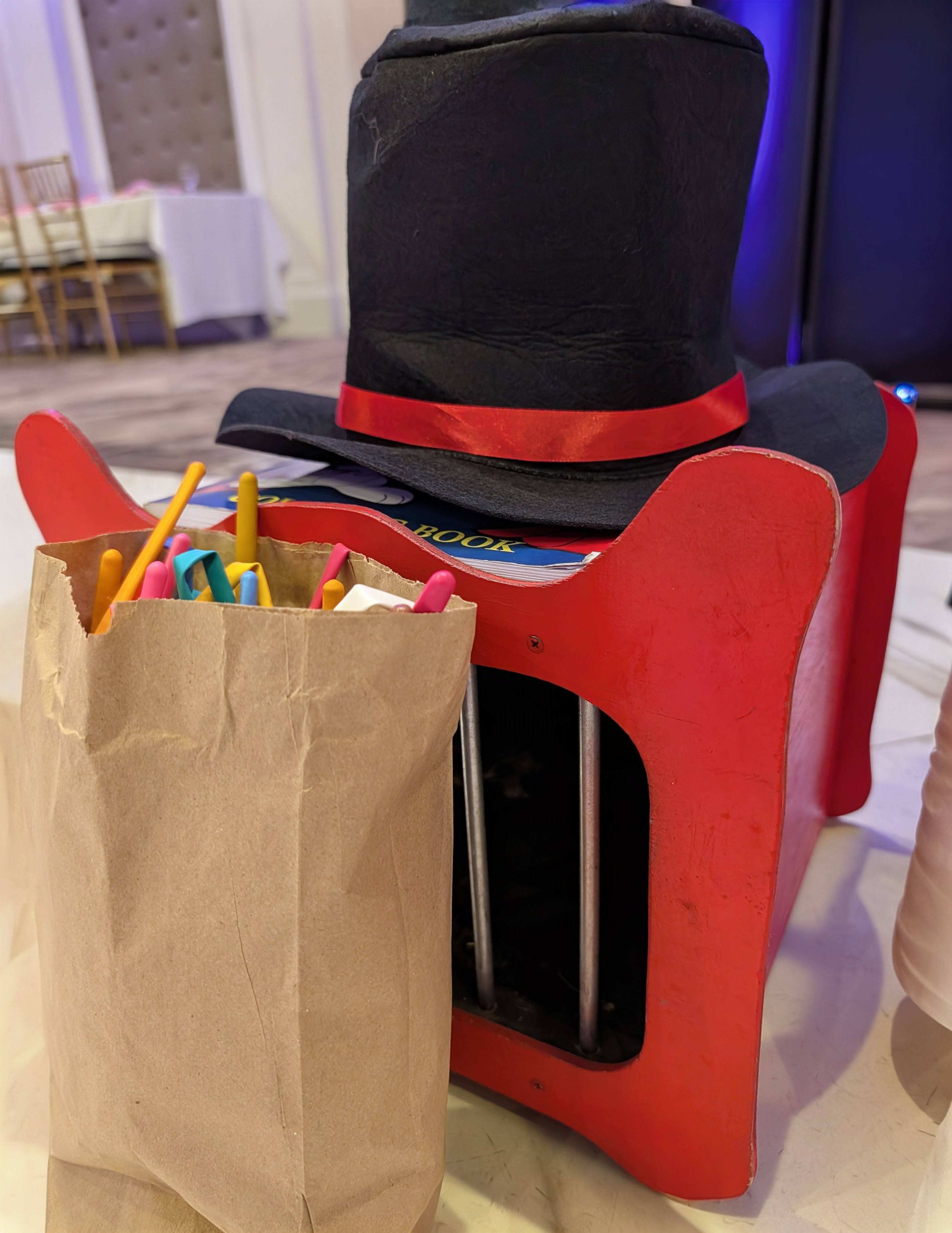 Hat box and balloons